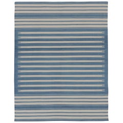 Rug & Kilim’s Indian Dhurrie Rug in Deep Blue and White Stripes