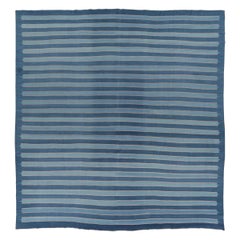 Rug & Kilim’s Indian Oversized Dhurrie Rug in Deep Indigo and Blue Stripes