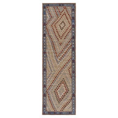 Alfombra de calle estilo Karabagh de Rug & Kilim con motivos geométricos policromáticos