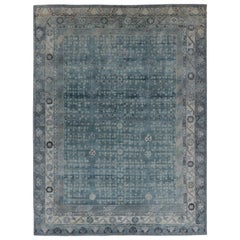 Rug 
Kilim’s Khotan-Inspired Rug in Blue with Gray Floral Patterns and Borders