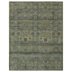 Rug & Kilim’s Khotan-Inspired Rug in Green with Pomegranate Floral Patterns