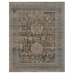 Rug & Kilim’s Khotan Rug in Brown, Red and Blue with Medallion Patterns