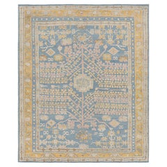 Rug & Kilim’s Khotan Samarkand Style Rug in Blue with Floral Medallions