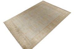 Rug & Kilim’s Khotan style rug in Blue with Beige, Gold Pomegranate Patterns