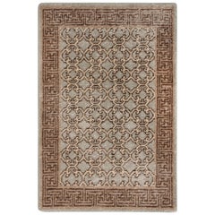 Rug & Kilim’s Khotan Style Rug in Distressed Blue, Beige-Brown Trellis Pattern