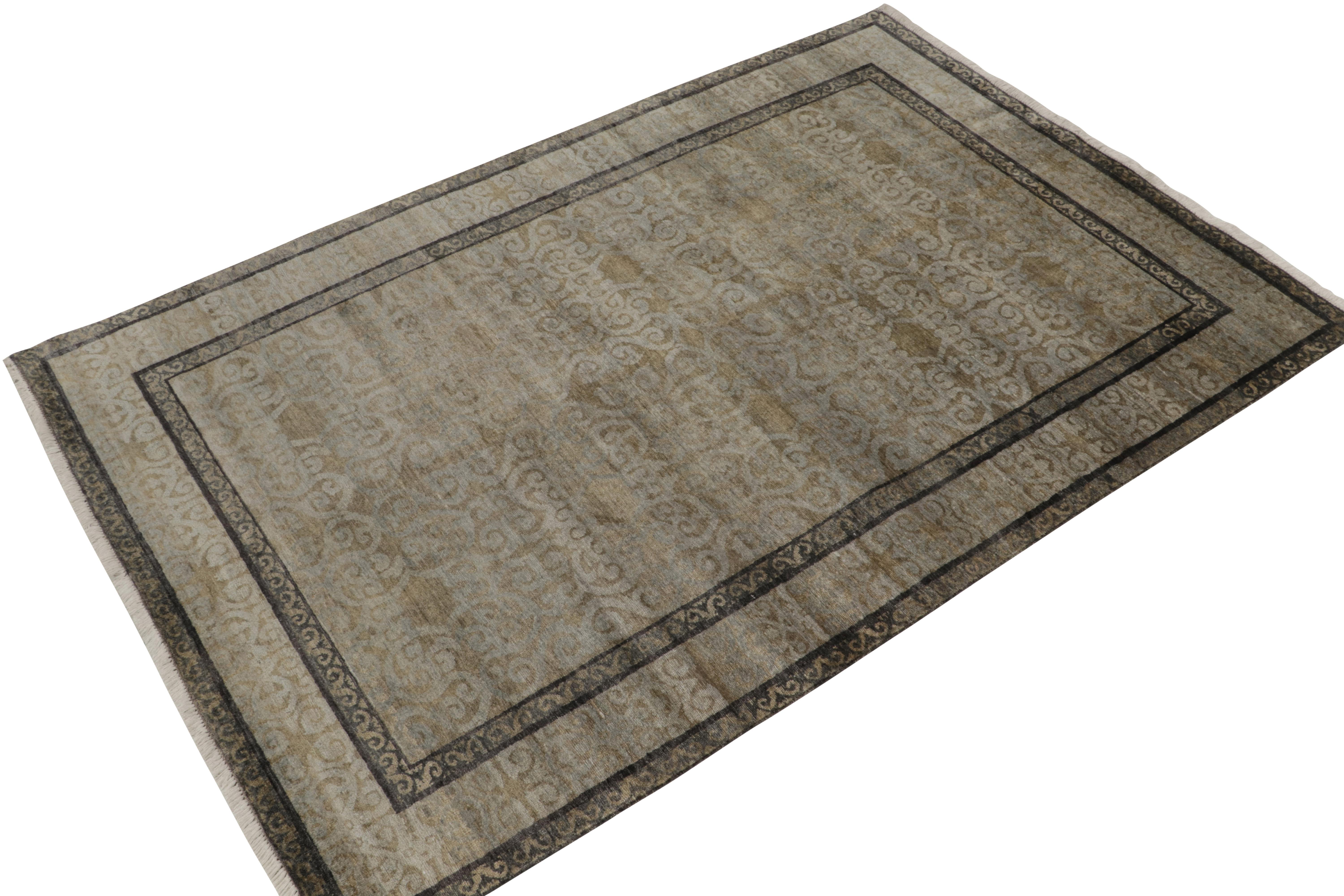 Hand-knotted in luxurious silk, this 6x9 contemporary rug from our Modern Classics collection draws inspiration from antique Khotan-Samarkand rugs. 

On the Design: The gracious scale enjoys a regal play of gold and beige-brown as the undertone to