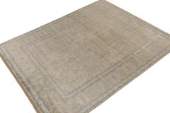 Rug & Kilim’s Khotan style Rug in Ivory with White & Blue Floral Patterns