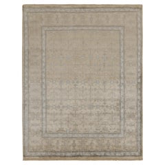 Rug & Kilim - Tappeto in stile Khotan in avorio con motivi floreali bianchi e blu