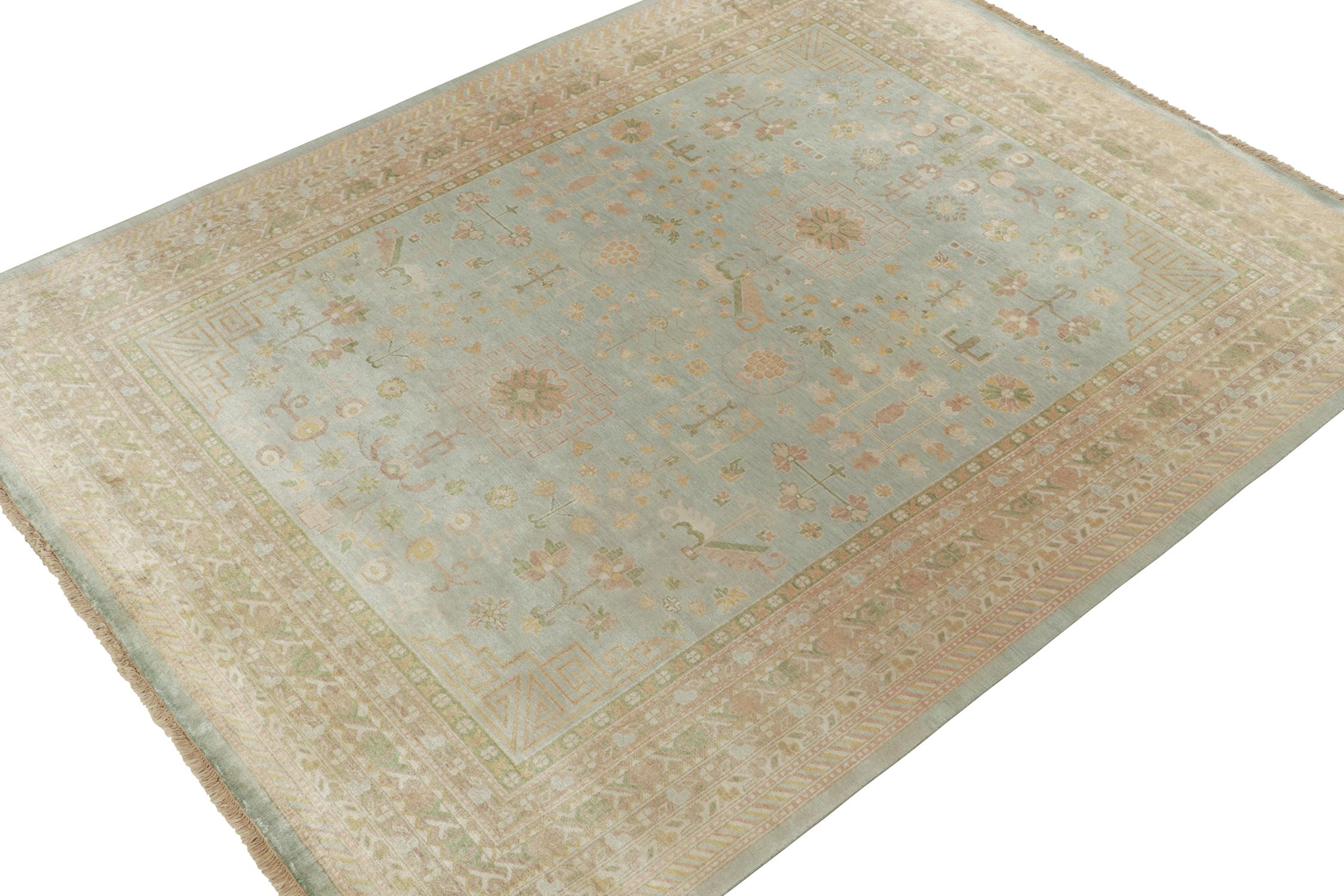 An 8x10 rug inspired from antique Khotan rug styles, from Rug & Kilim’s Modern Classics Collection. Hand knotted in silk, playing a gorgeous blue with gold, beige-brown and green in gorgeous, detailed floral patterns.
Further On the Design:
The