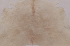 Rug & Kilim’s Large Cowhide Rug in Beige and Cream White Tones