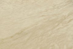 Rug & Kilim’s Large Cowhide Rug in Cream Tones