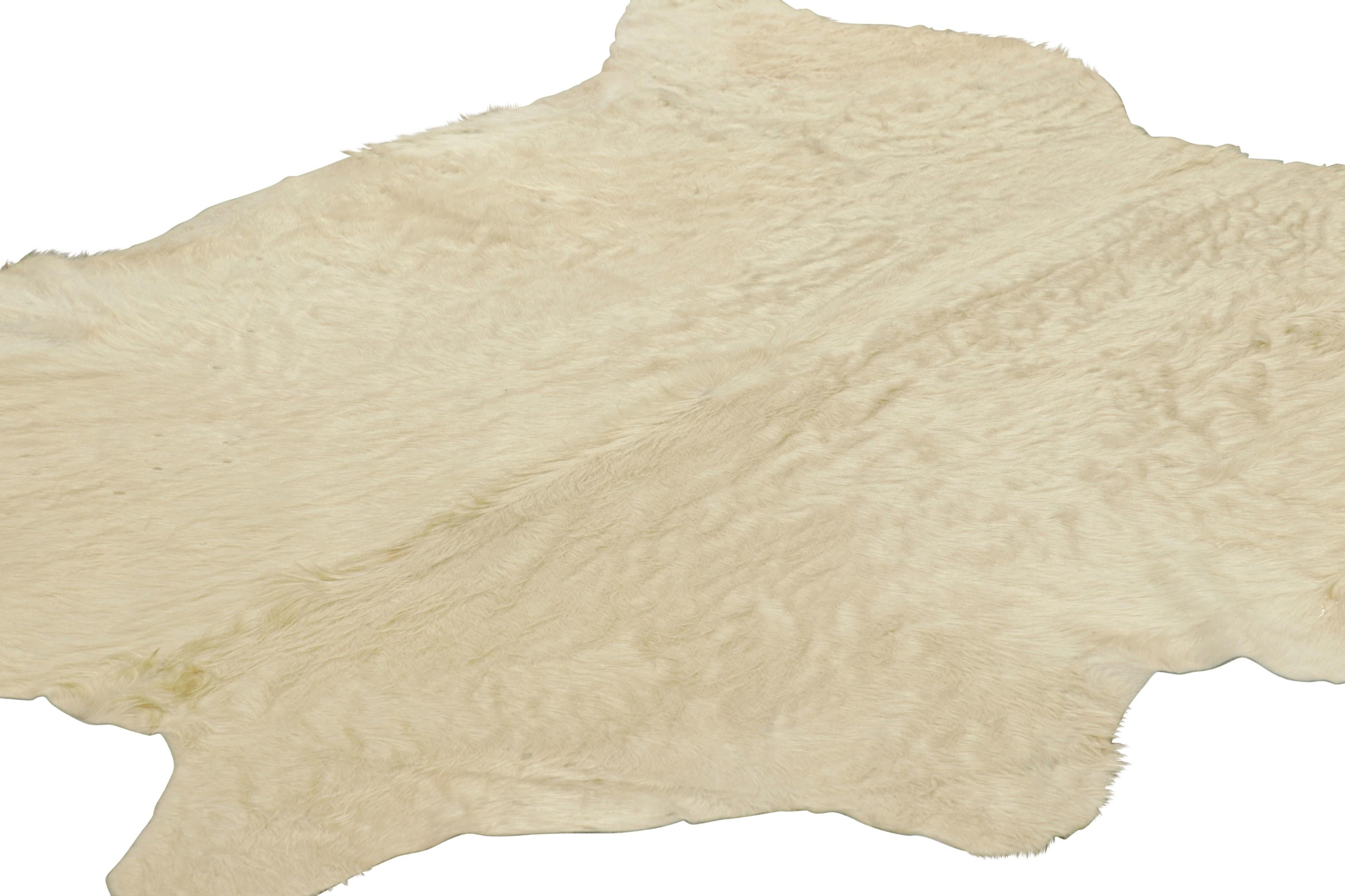 Hand-Knotted Rug & Kilim’s Large Cowhide Rug in Cream Tones For Sale