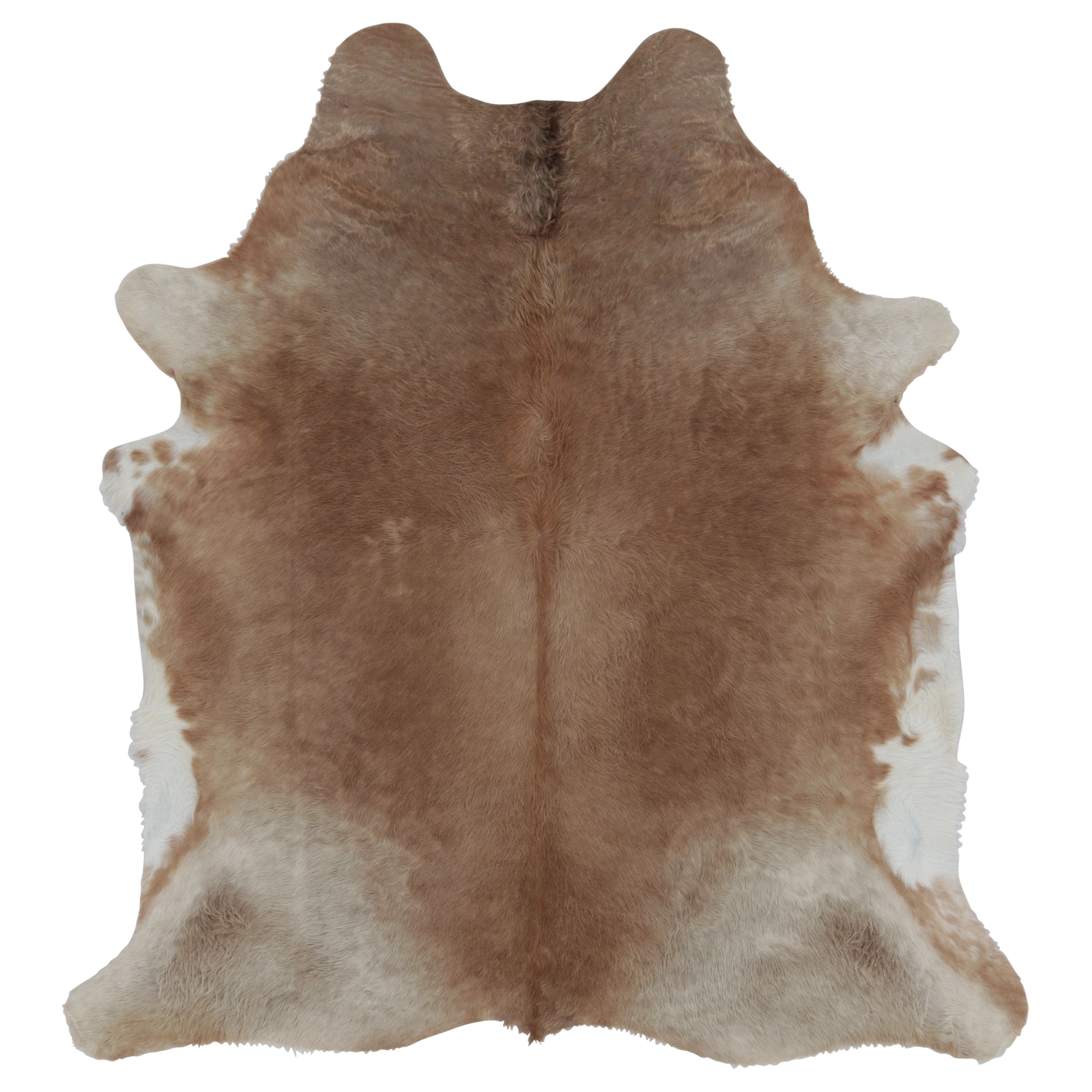 Rug 
Kilim’s Large Cowhide Rug in Warm Beige and Brown Tones