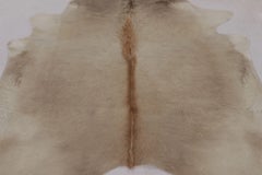 Rug & Kilim’s Large Cowhide Rug in Warm Beige and Cream Tones