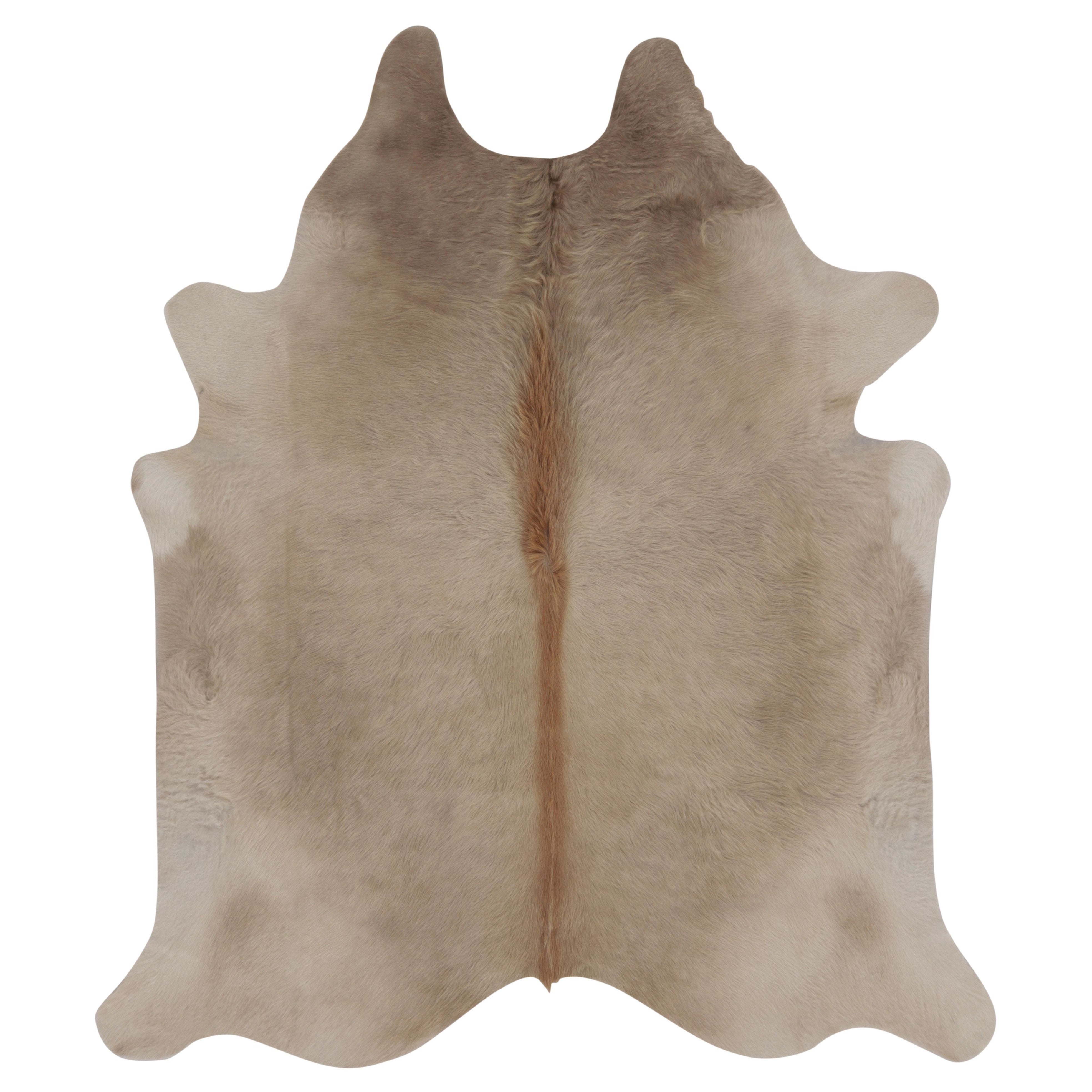 Rug 
Kilim’s Large Cowhide Rug in Warm Beige and Cream Tones