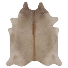 Rug 
Kilim’s Large Cowhide Rug in Warm Beige and Cream Tones