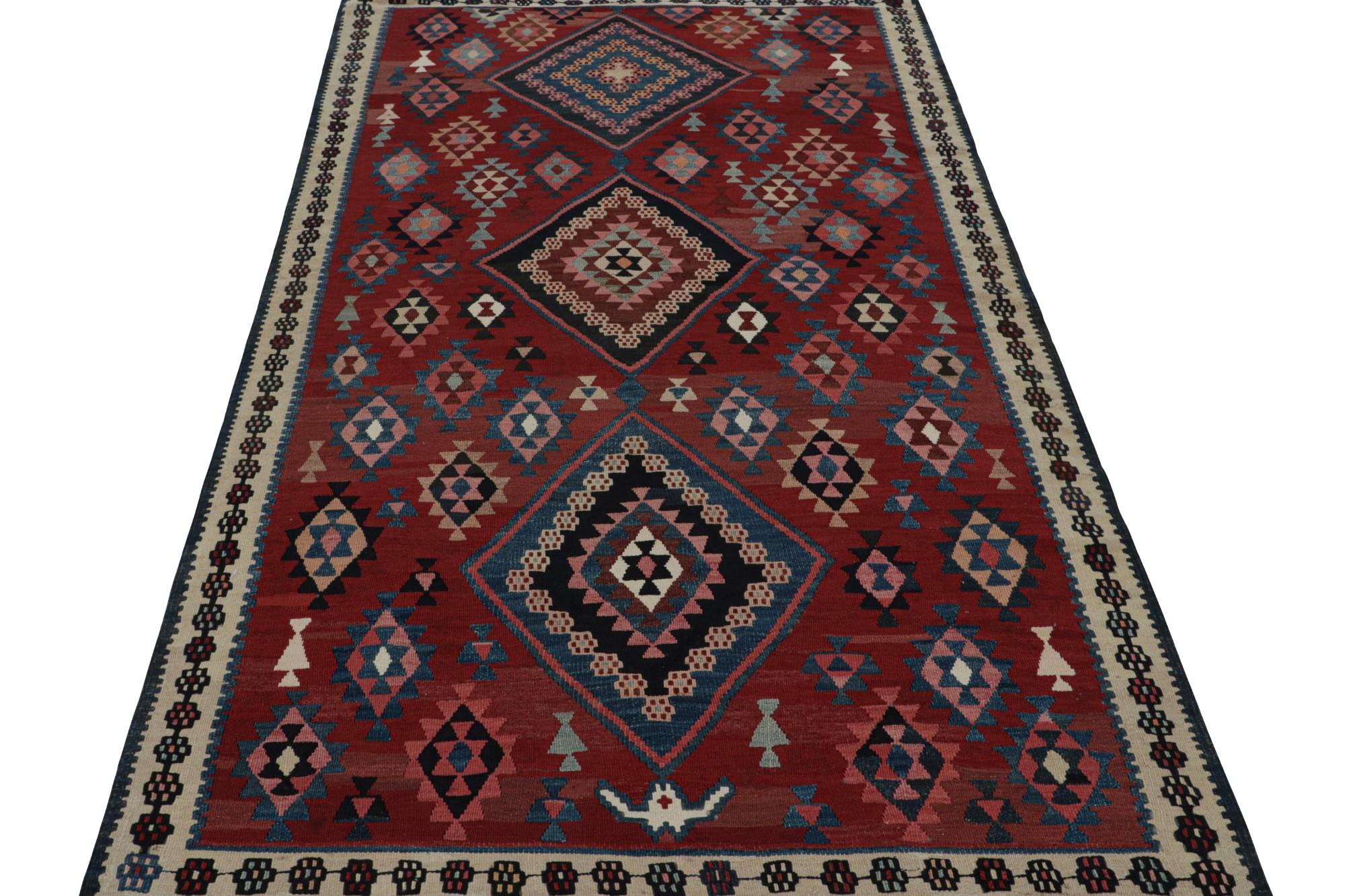 Tribal Rug & Kilim’s Mashwani Afghan Baluch rug in Red & Blue Geometric Patterns For Sale