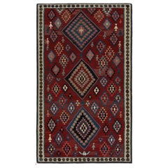 Rug & Kilim's Mashwani Afghan Baluch rug in Red & Blue Geometric Patterns (tapis afghan Baluch de Mashwani à motifs géométriques rouges et bleus)