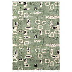 Rug & Kilim’s Mid-Century Modern Rug In Green And White Geometric Patterns