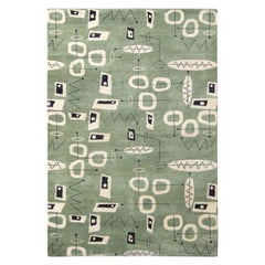 Rug & Kilim’s Mid-Century Modern Rug In Green And White Geometric Patterns
