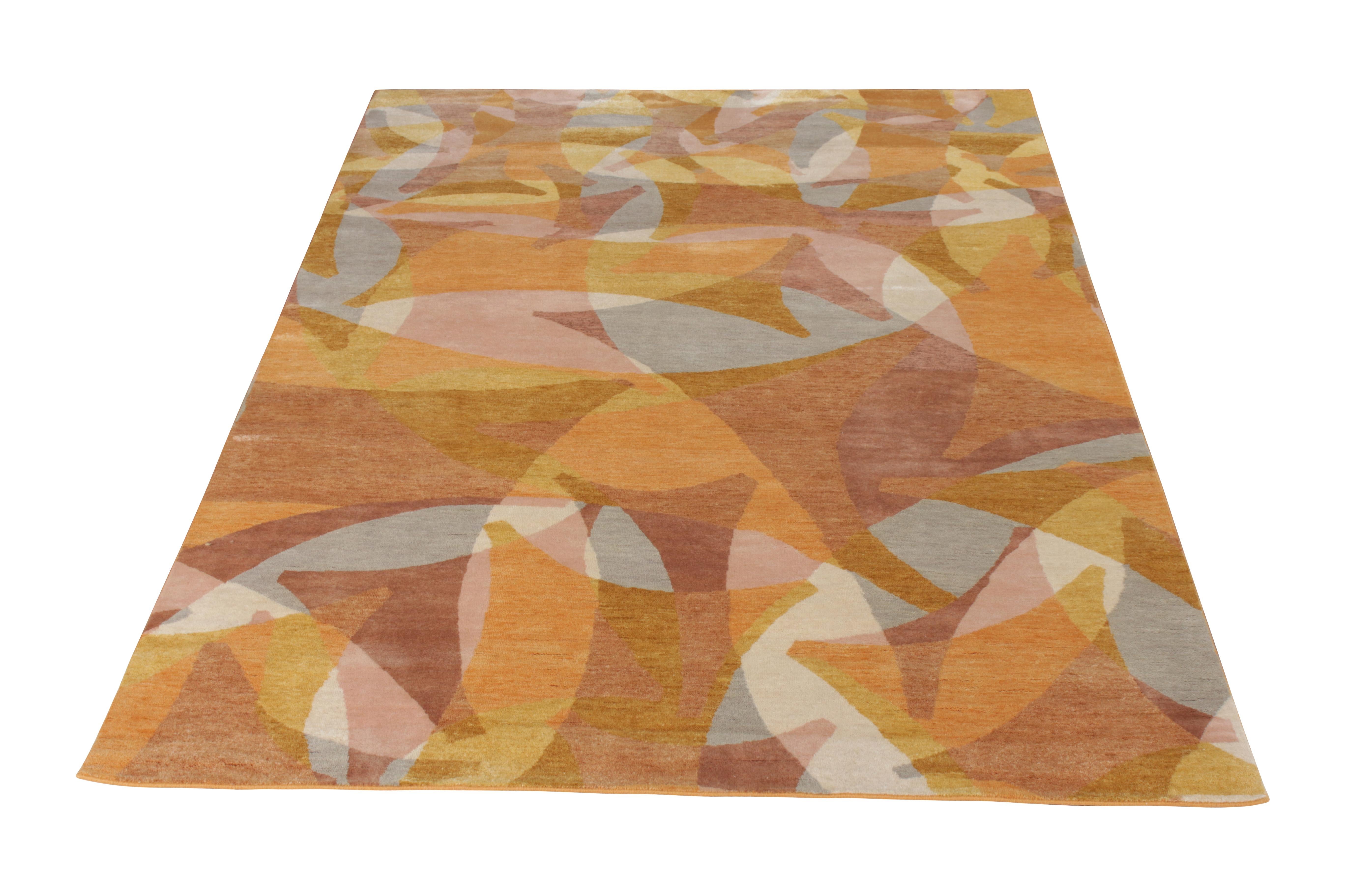 A 6 x 9 rug in hand-knotted wool, from Rug & Kilim’s bold Mid-Century Modern Collection. A fabulous marriage of unique colors in gold, beige-brown, pink, and varied accents throughout intriguing geometric patterns. Enjoying versatile size, engaging