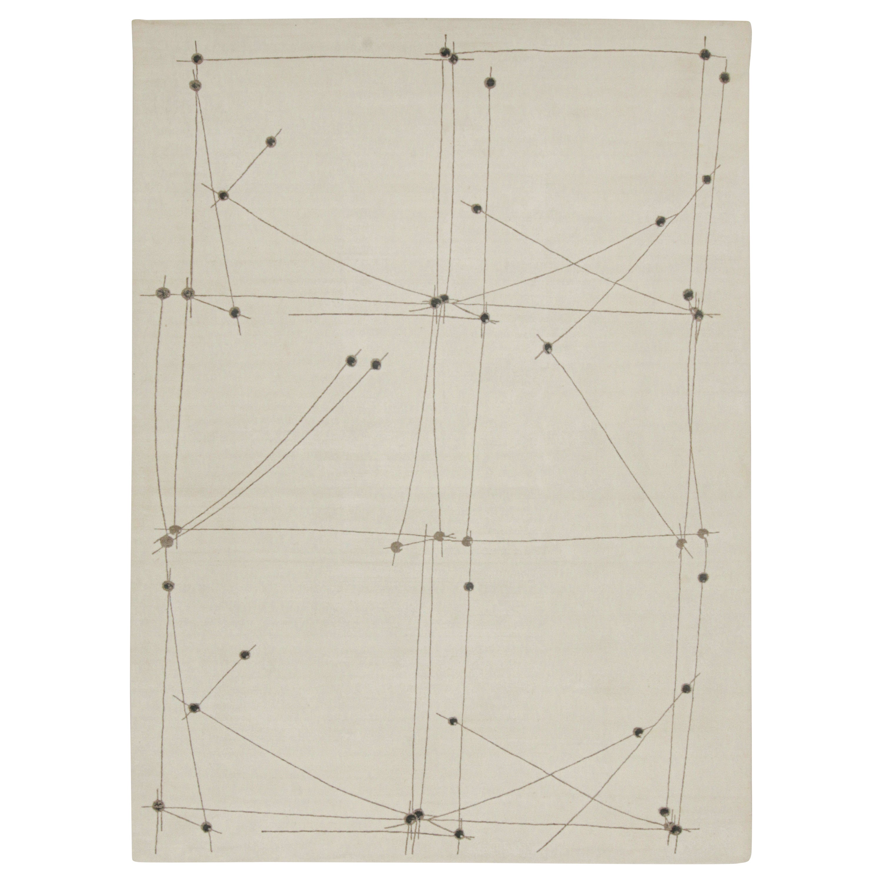 Rug & Kilim’s Mid-Century Modern Style Rug in White and Gray Geometric Pattern