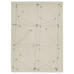Rug & Kilim’s Mid-Century Modern Style Rug in White and Gray Geometric Pattern
