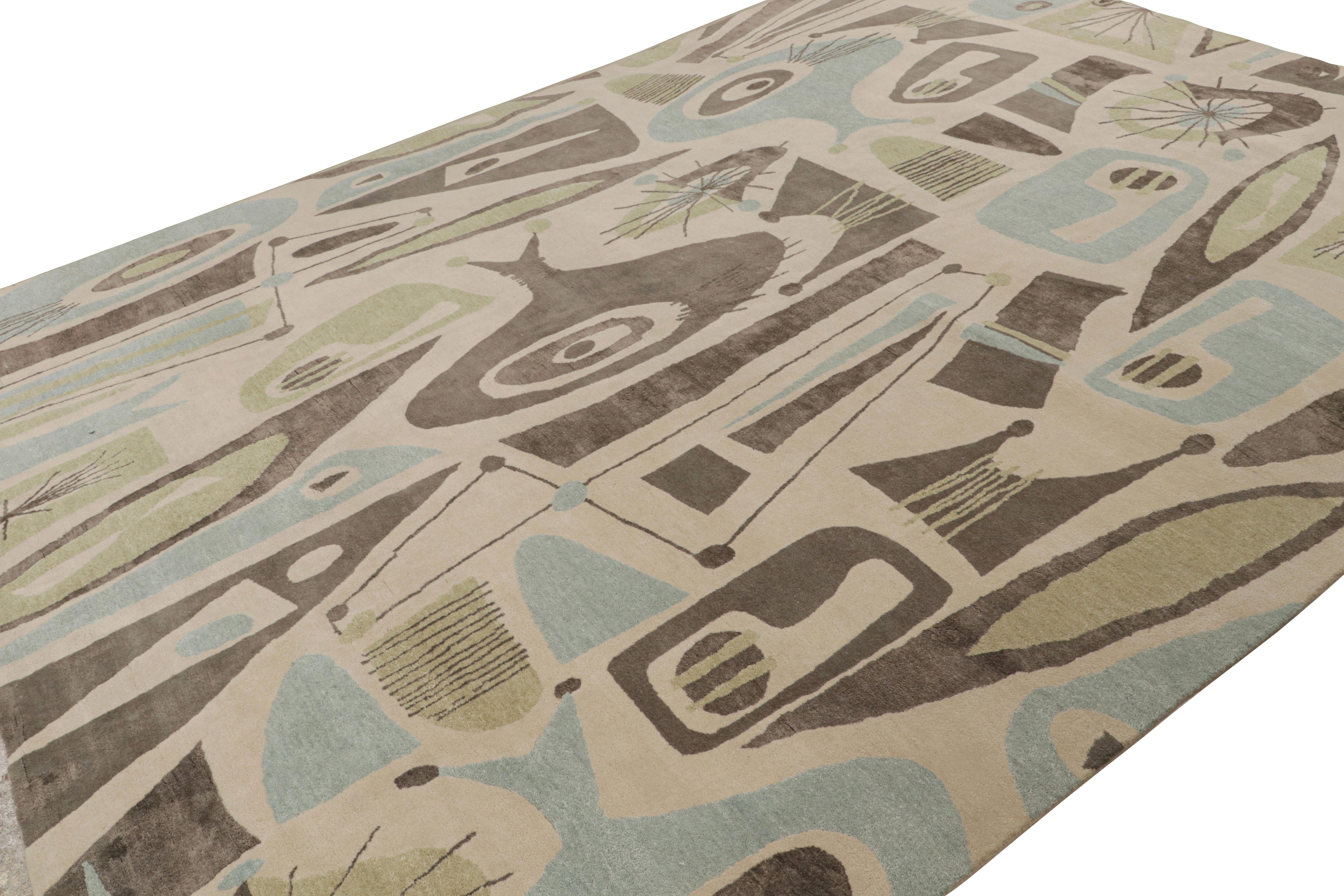 Hand-knotted in wool and all-natural silk, this 10×14 modern rug is a new addition to the Mid-Century Modern rug collection by Rug & Kilim. This collection is a bold exploration of 1950s style innovating large scale, refined texture, excellent color