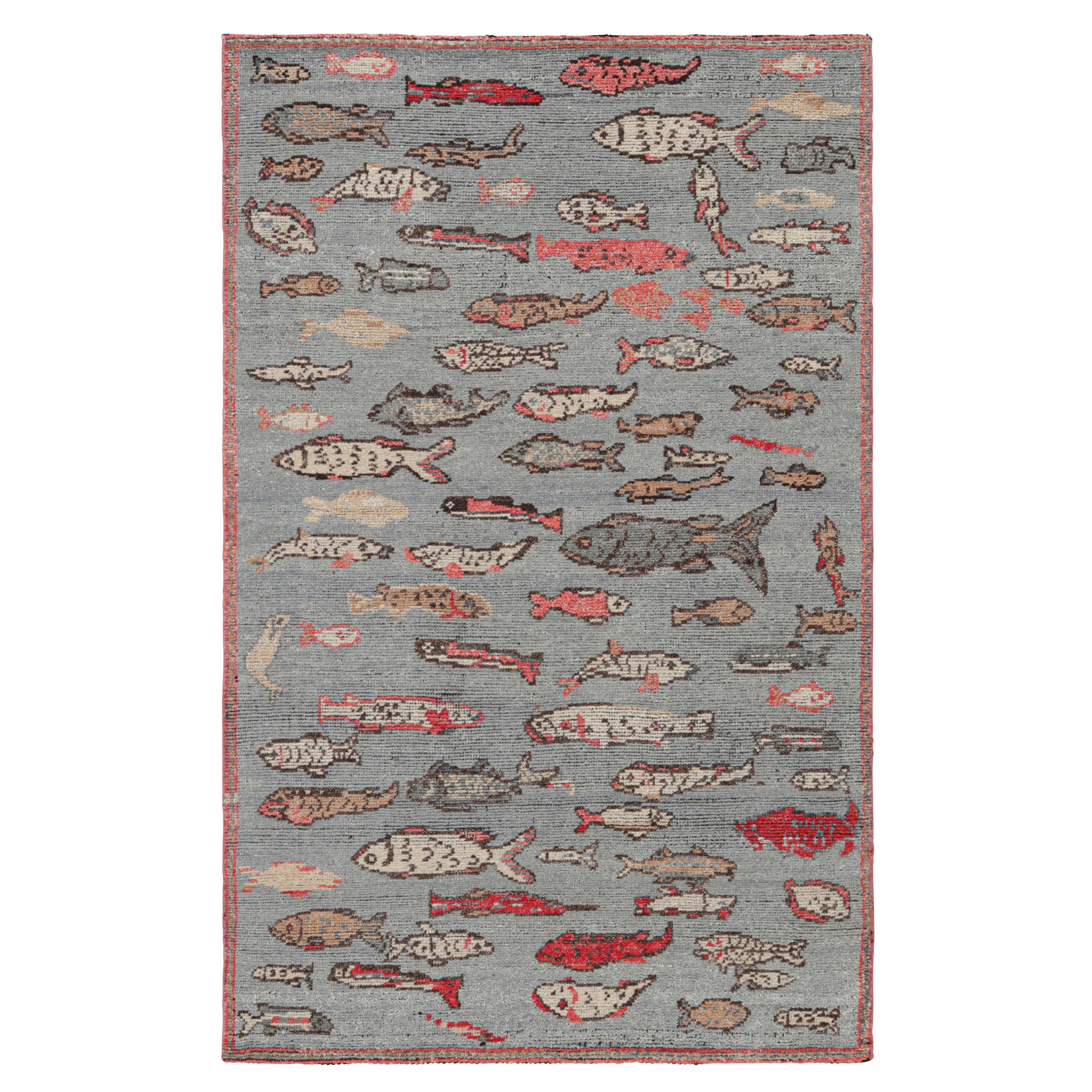 Rug & Kilim's Mid-Century Style Rug in Blue with Colorful Fish Pictorials (tapis de style du milieu du siècle en bleu avec des images de poissons colorés)