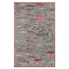 Rug & Kilim's Mid-Century Style Rug in Blue with Colorful Fish Pictorials (tapis de style du milieu du siècle en bleu avec des images de poissons colorés)