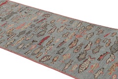 Rug & Kilim’s Mid-Century Style Runner Rug in Blue with Colorful Fish Pictorials