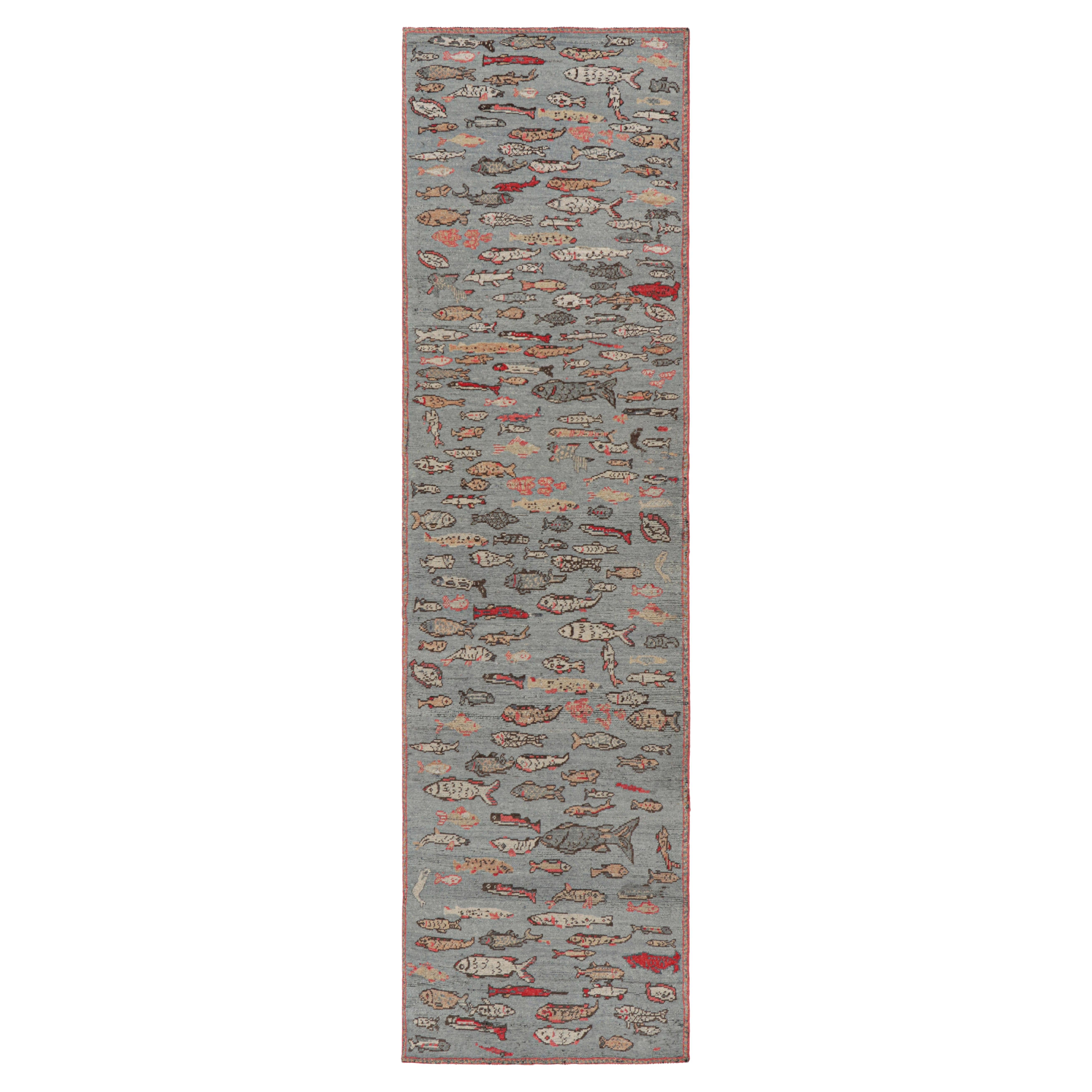 Rug & Kilim’s Mid-Century Style Runner Rug in Blue with Colorful Fish Pictorials