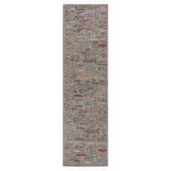 Rug & Kilim’s Mid-Century Style Runner Rug in Blue with Colorful Fish Pictorials