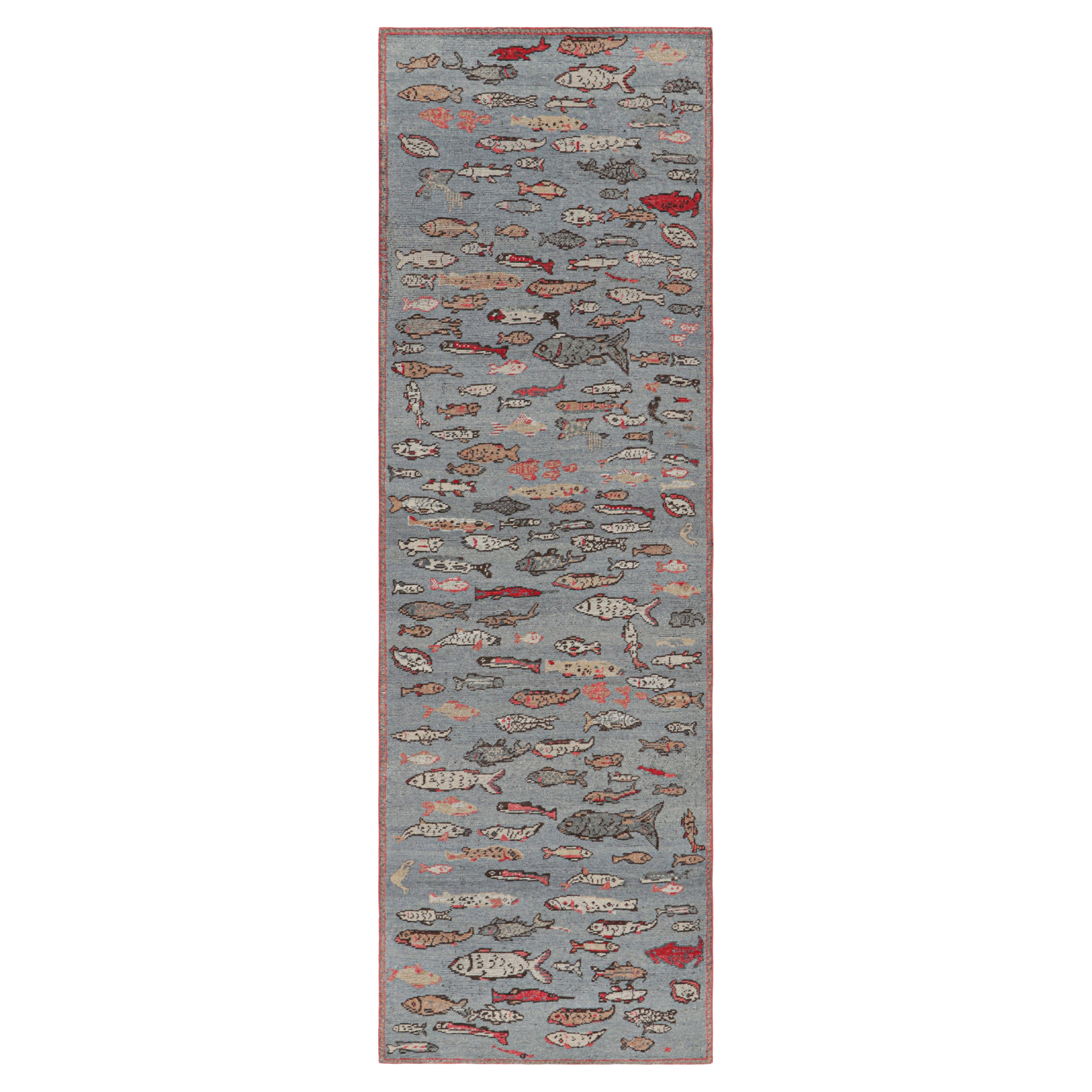 Rug & Kilim’s Mid-Century Style Runner Rug in Blue with Colorful Fish Pictorials