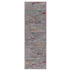 Rug & Kilim’s Mid-Century Style Runner Rug in Blue with Colorful Fish Pictorials