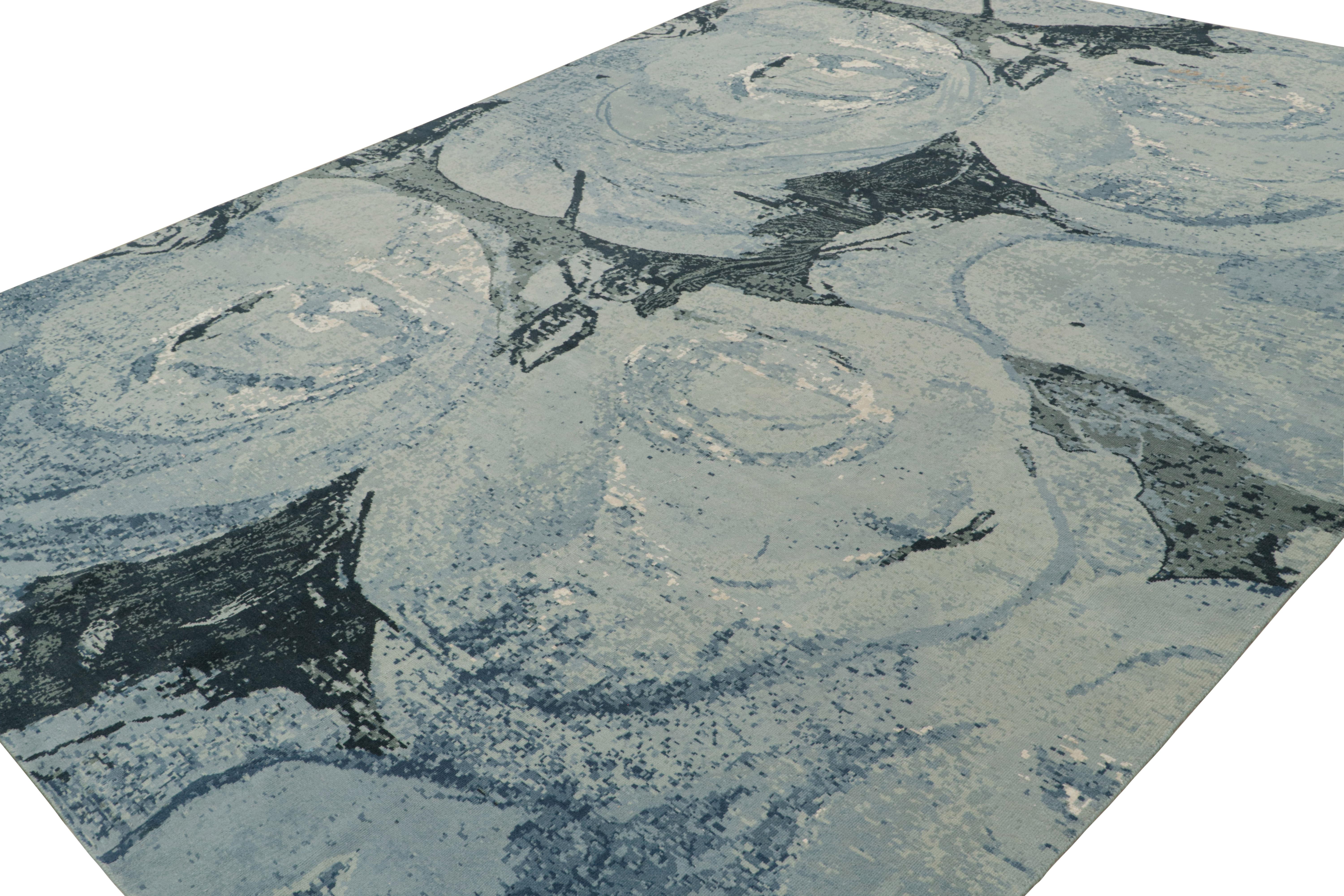 Noué à la main en laine et en soie, ce tapis moderne 11x14 originaire d'Inde présente un design qui s'apparente particulièrement à une sorte d'impressionnisme abstrait - une forme de dessin sur des peintures florales aux motifs tourbillonnants.