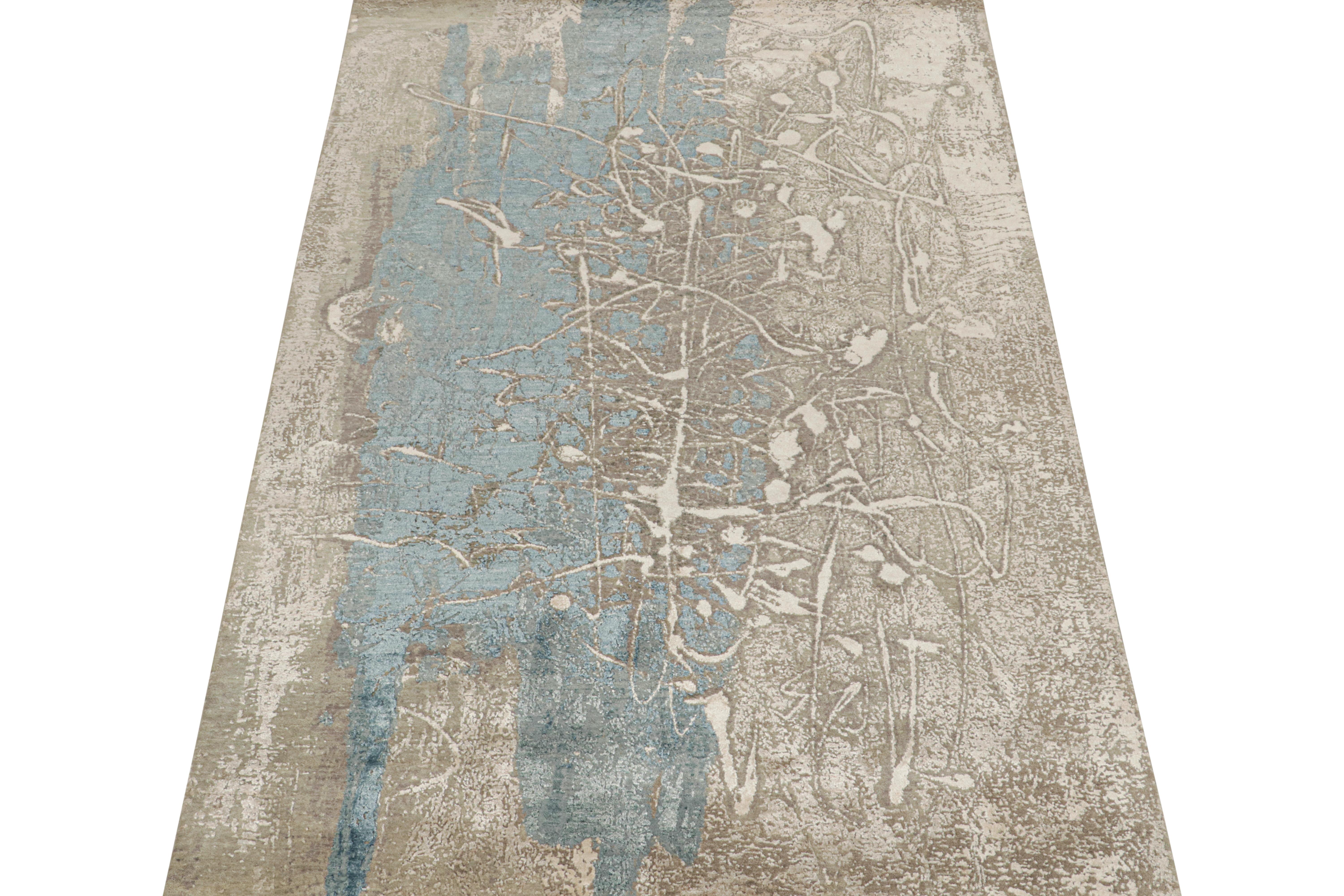 This 7x10 abstract rug is an exciting new addition to Rug & Kilim’s Modern rug collection. Hand-knotted in wool,cotton and silk, its design explores expressionist style in a bold new fashion and intricate quality.

This particular designer rugs
