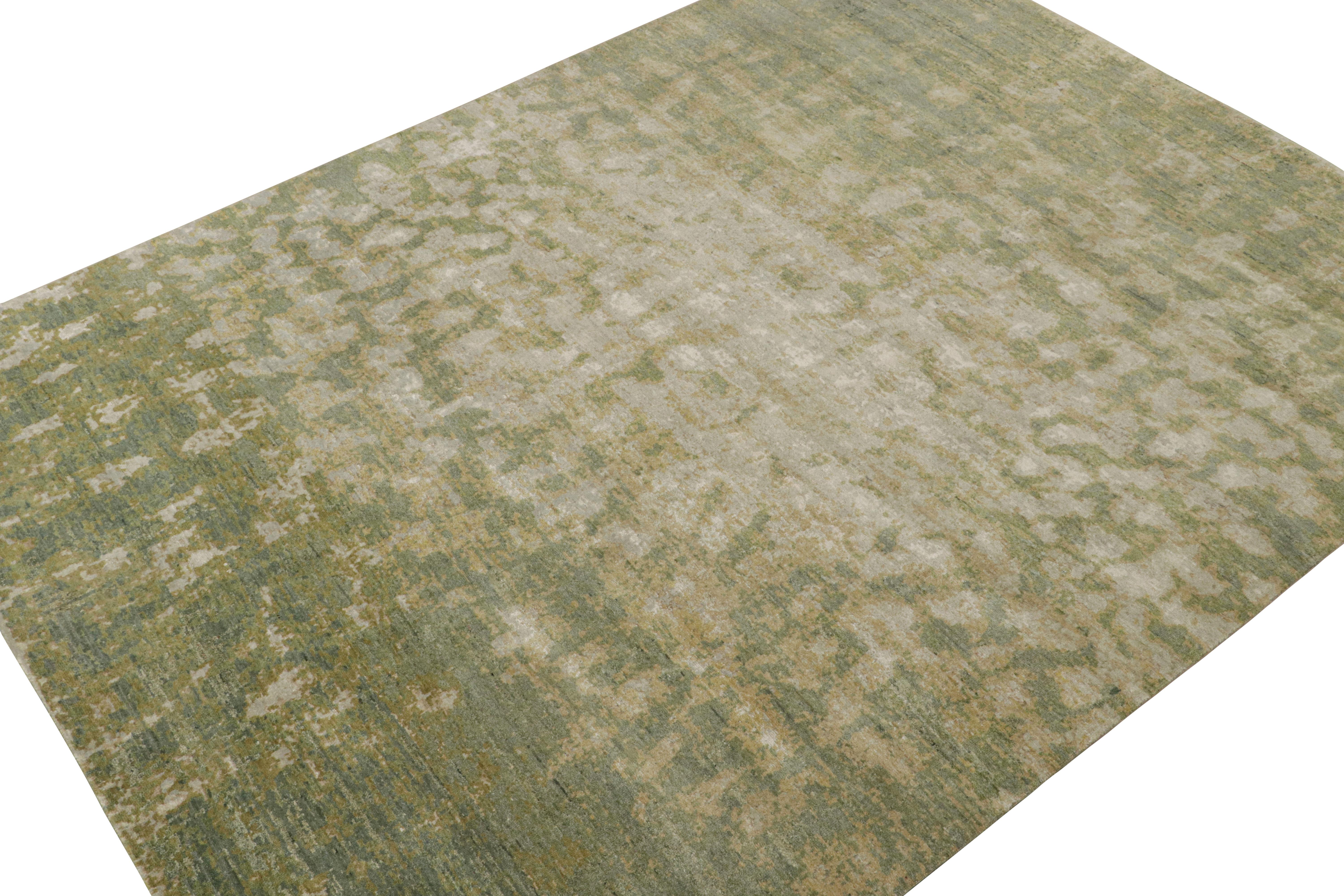 Hand-knotted in wool, silk & cotton, a 9x12 abstract rug from Rug & Kilim’s Modern collection.

On the Design: 

This rug enjoys a pattern like watercolor paintings in green, gold and gray, with some chartreuse accents. Connoisseurs will admire the