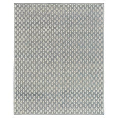 Rug & Kilim’s Modern Block Print Rug in Blue with White Floral Pattern