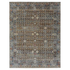 Rug & Kilim’s Khotan Rug in Brown and Blue With Geometric Floral Patterns