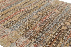 Rug & Kilim’s Khotan Rug With Colorful Geometric Floral Patterns