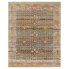 Rug & Kilim’s Khotan Rug With Colorful Geometric Floral Patterns