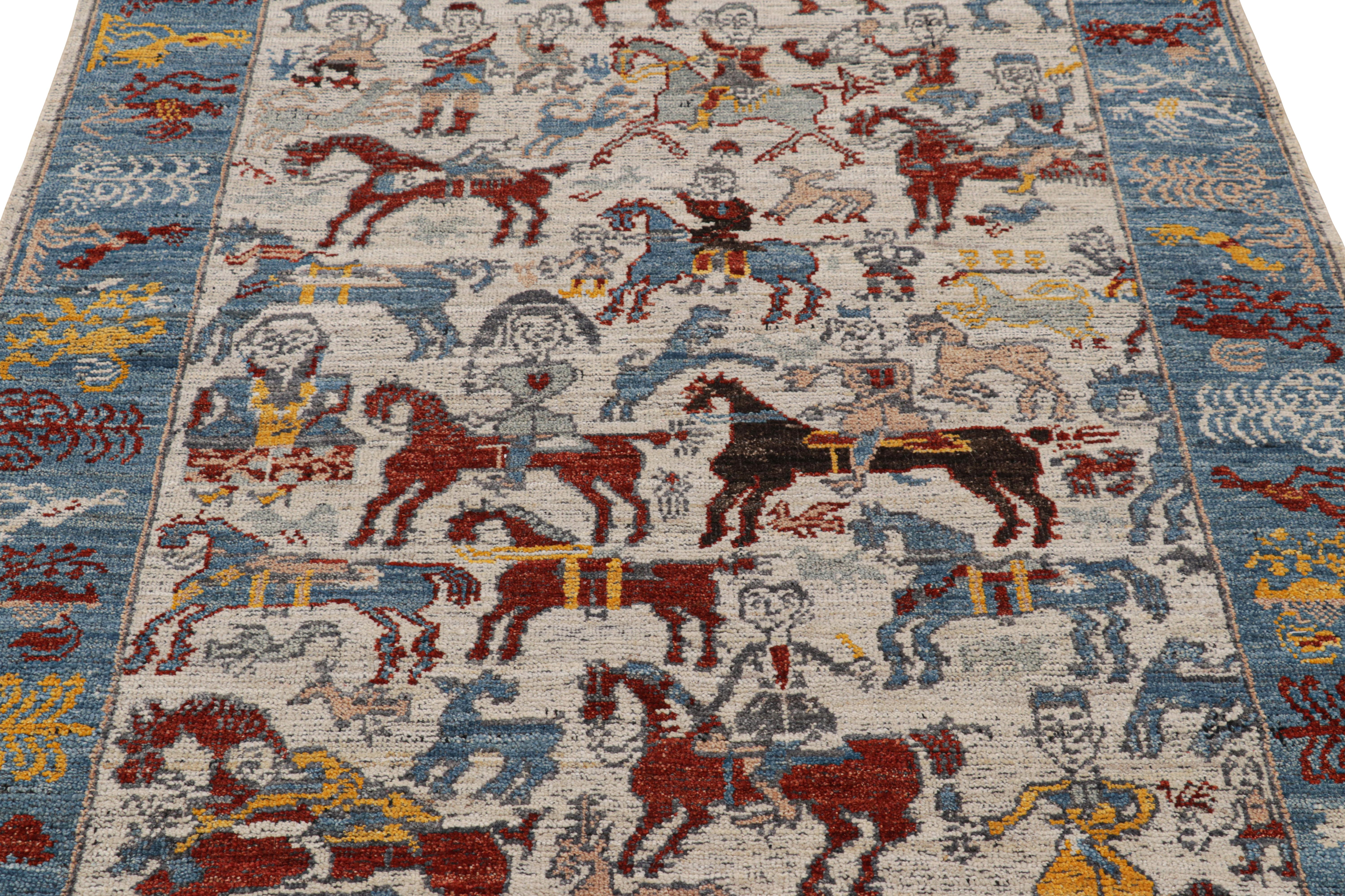 Ce tapis 4x6 en laine nouée à la main de la collection Burano de Rug & Kilim s'inspire des tapis picturaux tribaux et caucasiens, avec un amour particulier pour les humains et les chevaux.

Sur le Design : 

Le champ présente des guerriers à cheval