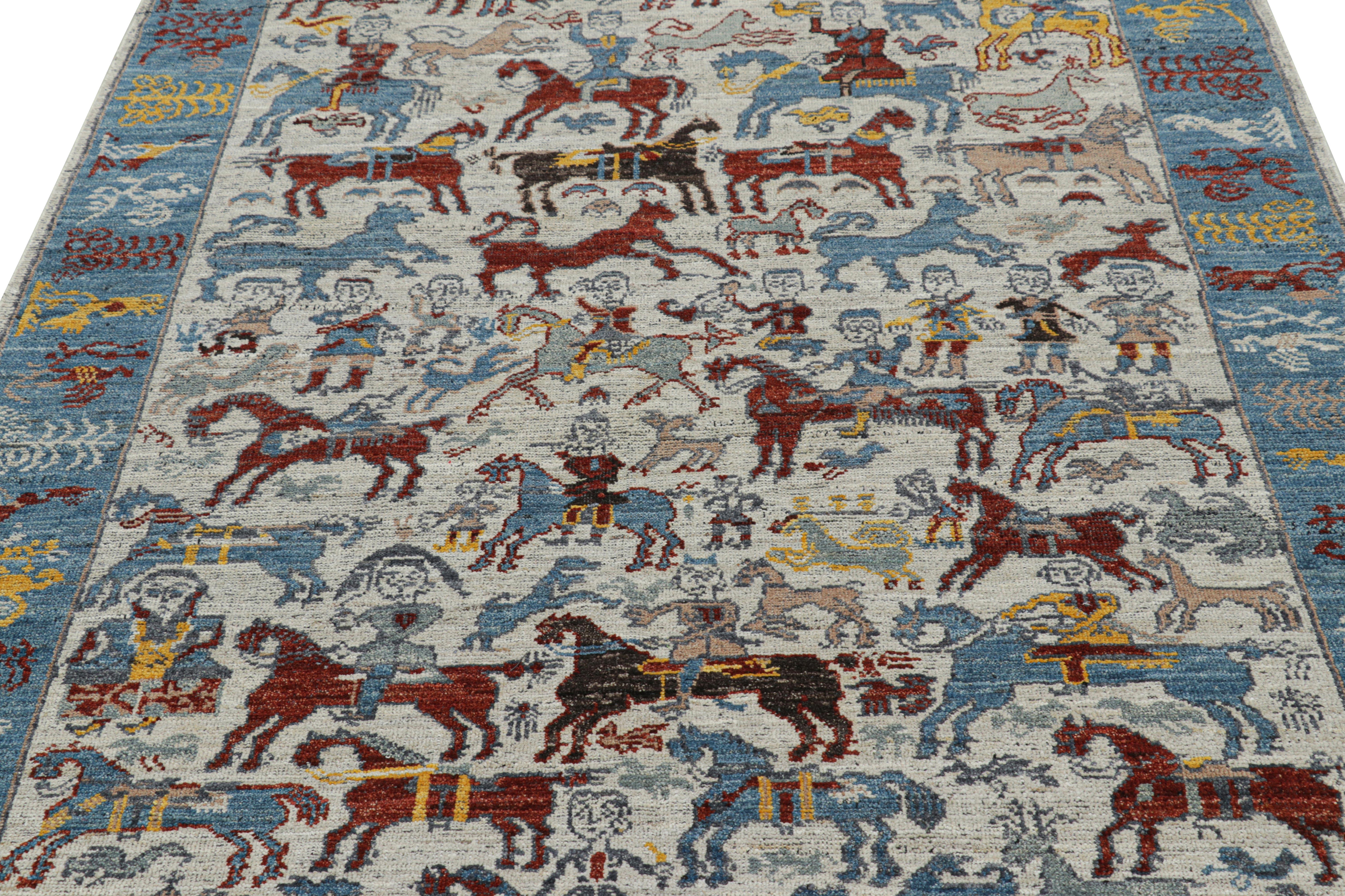 Questo tappeto 5x8 in lana annodato a mano della collezione Burano di Rug & Kilim si ispira ai tappeti pittorici tribali e caucasici, con un particolare amore per le rappresentazioni umane e di cavalieri nell'arte popolare e nelle illustrazioni