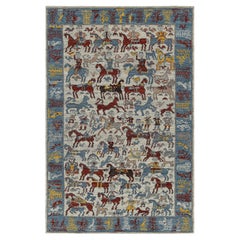 Rug & Kilim’s Modern Caucasian Rug with Colorful Horse and Rider Pictorials