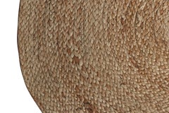 Alfombra moderna de yute circular en tonos beige-marrón y crema de Rug & Kilim