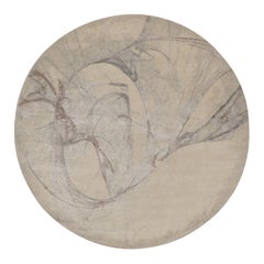 Alfombra circular moderna de Rug & Kilim, atrevidos motivos abstractos en blanco y gris plateado