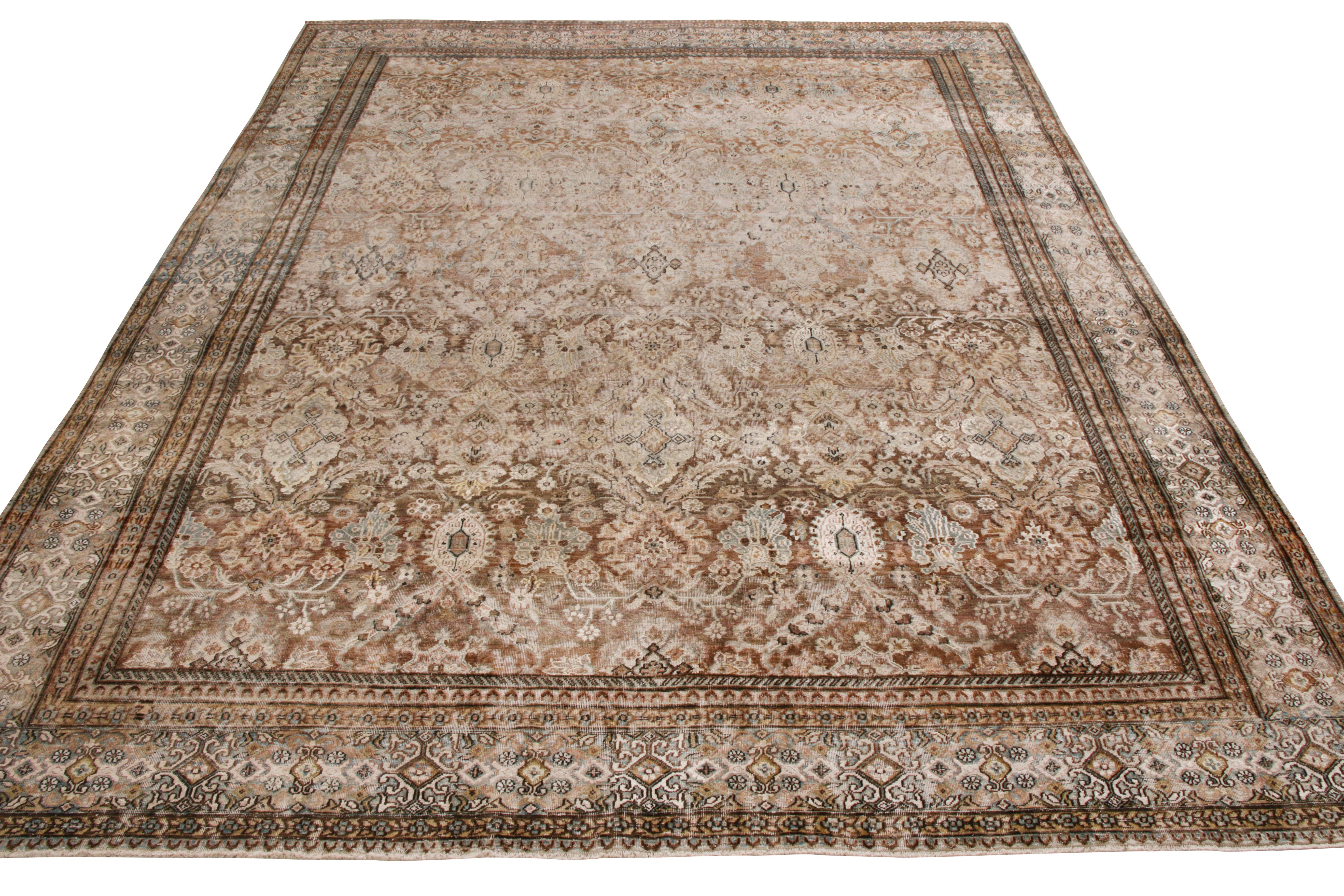 A magnificent 8 x 10 ode to antique Oriental rug styles, joining Rug & Kilim’s Modern Classic collection. True to the essence, the rug features gorgeous palmette floral patterns in luscious hues of beige-brown with blue accenting tastefully. An