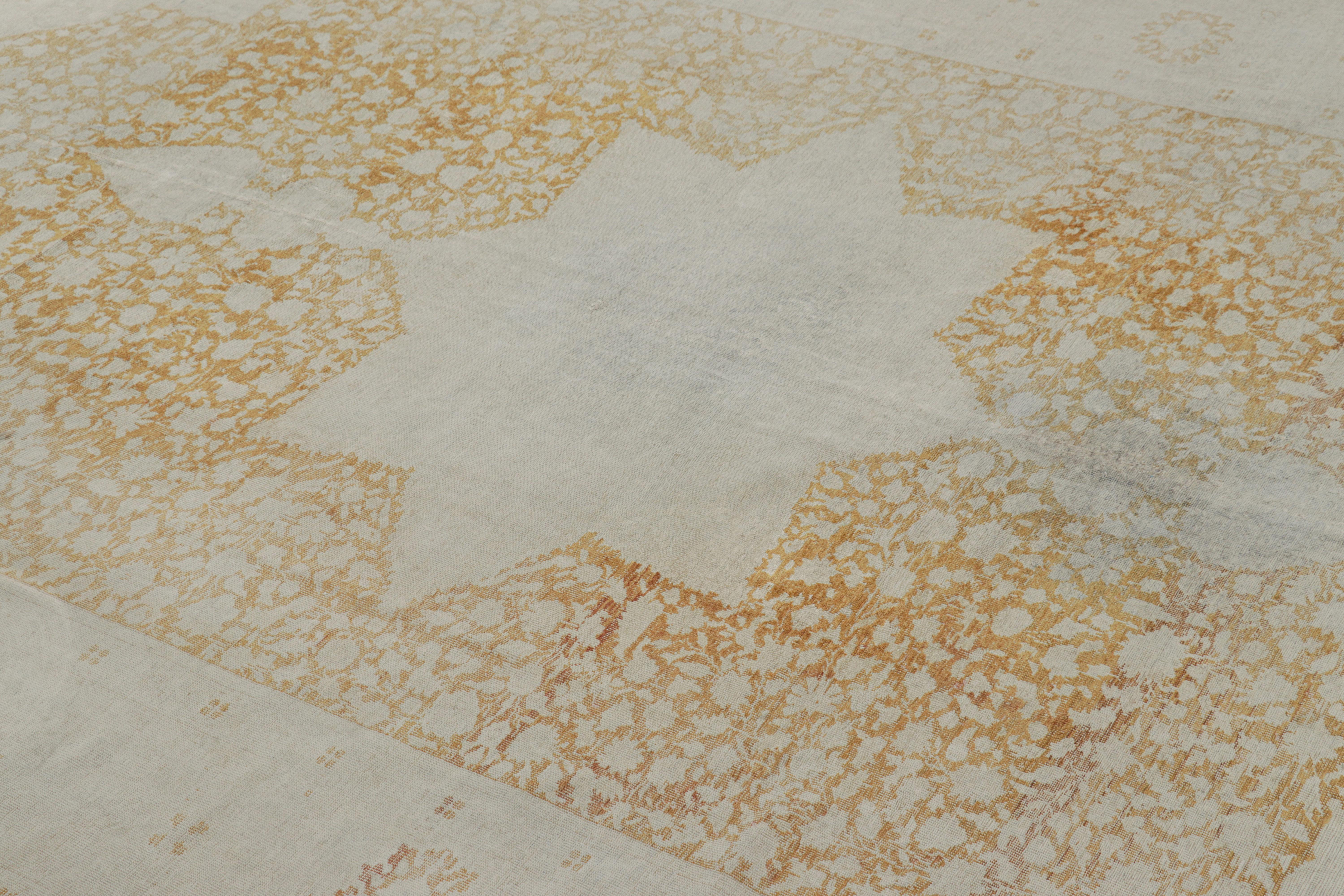 Hand-knotted in wool, this 7x9 contemporary rug is an exciting new piece in Rug & Kilim’s Modern Classics Collection with a large-sized medallion in gold tones. 

On the Design: 

This modern classic rug presents an ethereal medallion composition