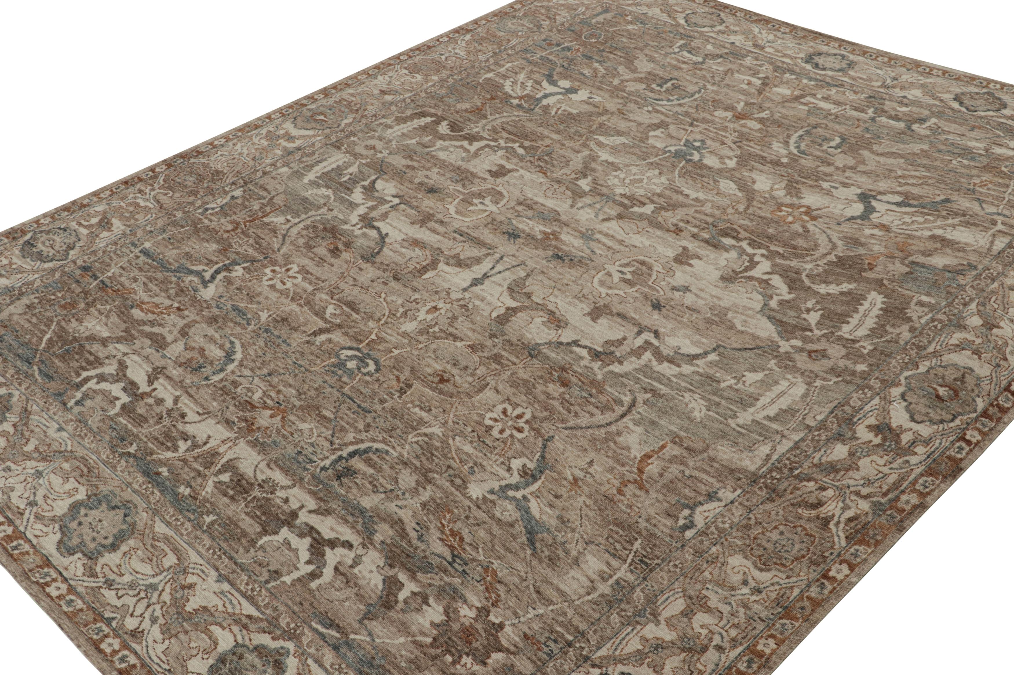 Hand-knotted in wool and silk, this 9x12 rug is from the Modern Classics Collection by Rug & Kilim. Its design features rich brown, rust tones and navy blue in traditional floral patterns inspired by antique rugs.

On the design: 

Admirers of the